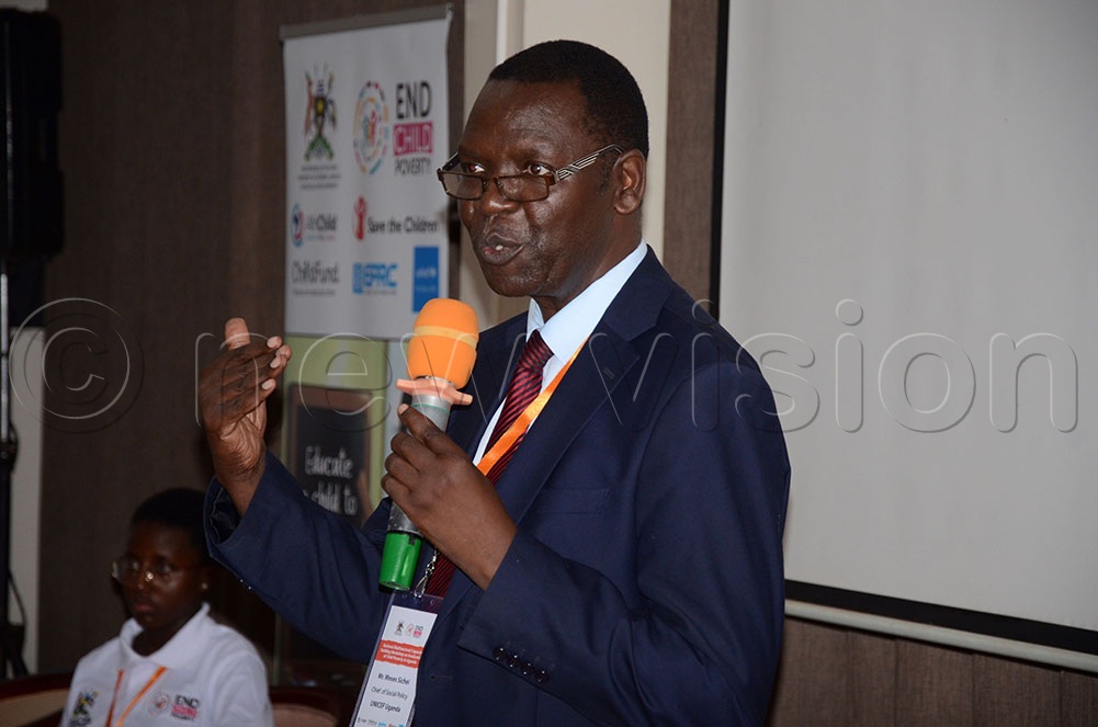 Dr. Moses Sichei, the Chief of Social Policy at UNICEF Uganda addressing participants during the National workshop on Eradication of Child Poverty at the Source of the Nile Hotel in Jinja City on Friday. (Credit: Donald Kiirya)