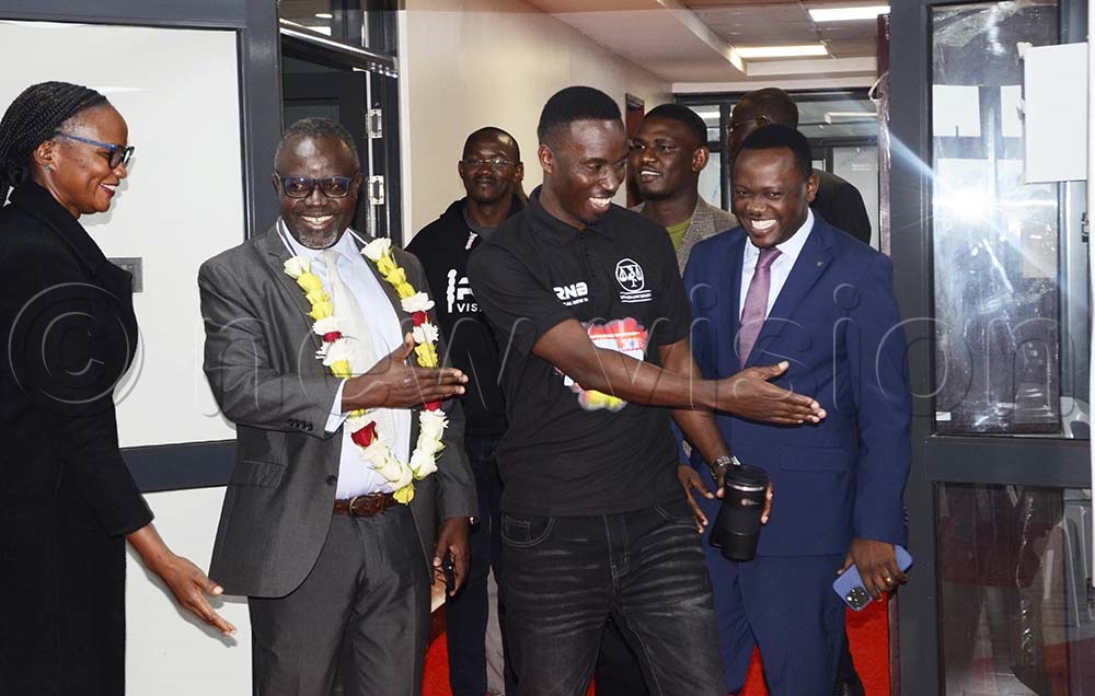 From left to right: Christine Abwaka, ULS Head Human Resource, Prof Venansius Baryamureeba, Anthony Asiimwe, ULS Vice President, and Tony Galandi interacting after signing the memorandum of understanding at Uganda Law Society offices in Kampala on August 18, 2025. (Credit: Juliet Kasirye)