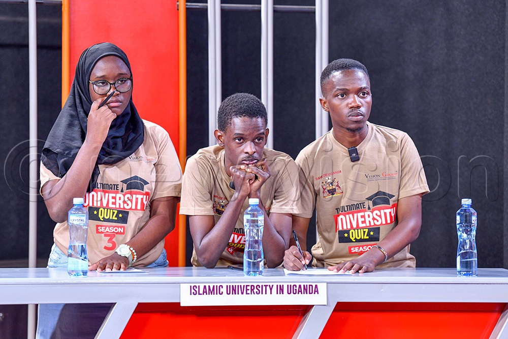  (left to right) IUIU  students; Samantha Marunga, Yusuf Bazatoha and Kyewalanga during the Ultimate University Quiz Season 3. (Photo by Miriam Namutebi)