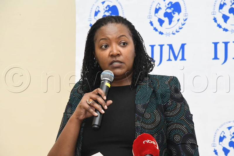 Wamaitha Kimani, International Justice Mission (IJM) County Director, speaking during the launch of the report. (Photo by Mpalanyi Ssentongo)