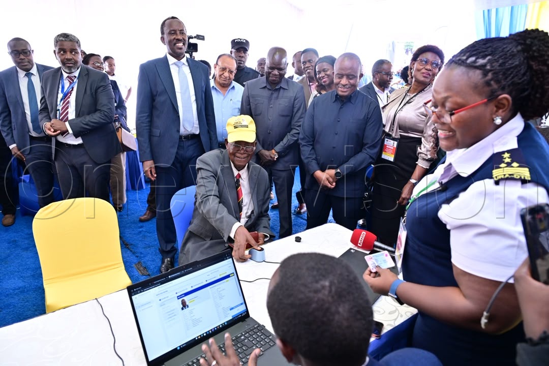 The Minister of Internal Affairs, Prof. Ephraim Kamuntu during the registration process. (Credit: Miriam Namutebi)