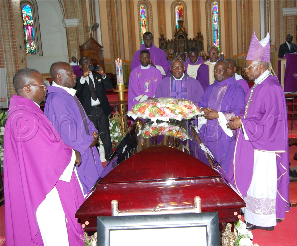 Catholic priests led by Archbishop Dr. Augustine Kasujja (wearing a mitre) paying their last respects to the late Prince Dr. Paul Kyabaggu during the requiem mass at Lubaga Cathedral on Wednesday, September 24. 