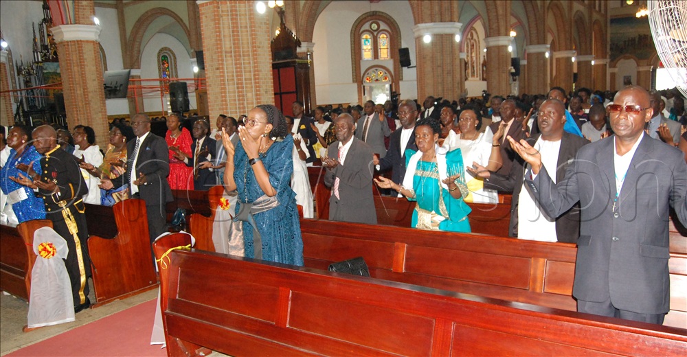 The Catholic faithful in prayer during the Pontifical mass of the closure of the Catholic Jubilee Year of Hope at Lubaga Cathedral on December 28, 2025.