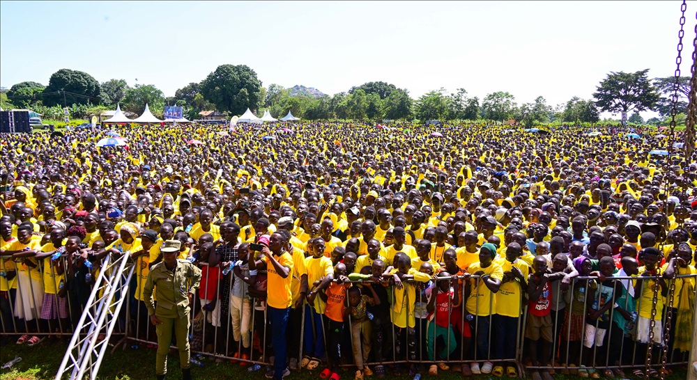 Ngora district NRM supporters listening to their party's presidential flagbearer, President Yoweri Museveni, during a campaign rally at BKC Demo Primary School grounds in Ngora district on Tuesday. (Credit: PPU)