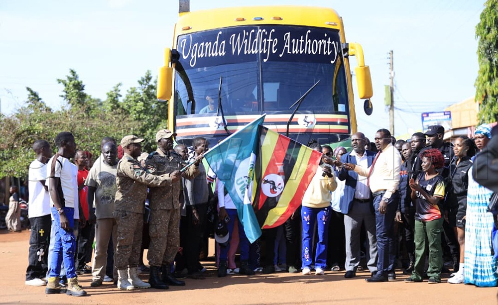UWA staff together with some leaders in Masindi flagging off the community residents of Masindi for a trip to Murchison Falls National Park. (All Photos by Julius Luwemba)