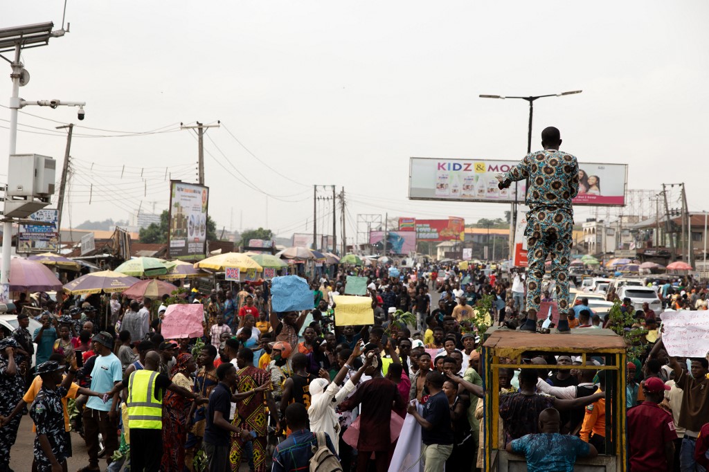 Demonstrators gatherduring a protest against the hike in price and hard living conditions in Ibadan on February 19, 2024. 