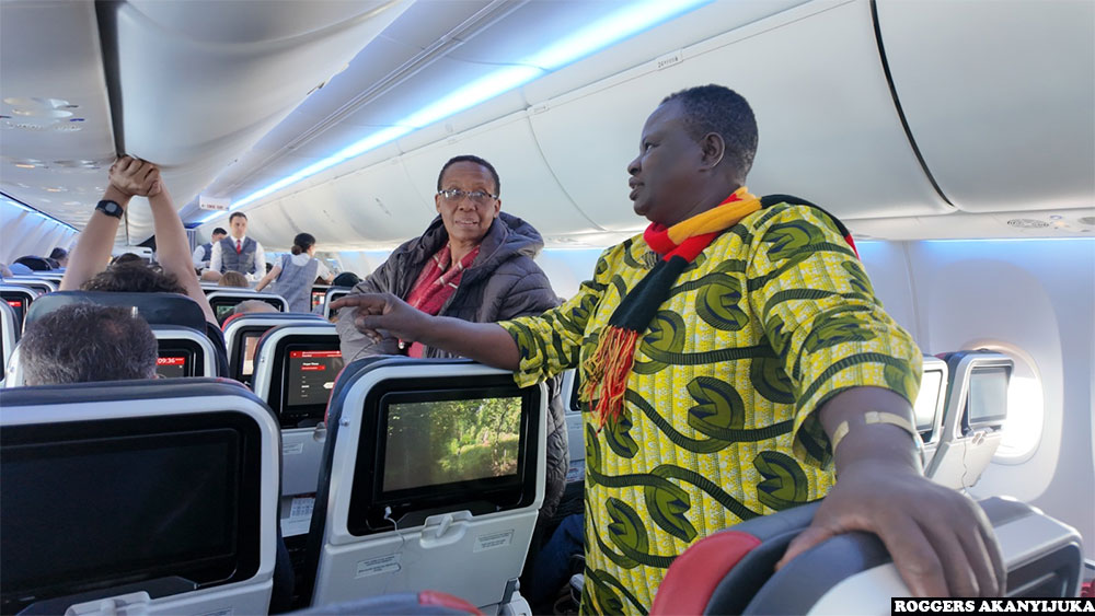 Dr Annet Mugisha Kajura from Uganda's education ministry of education and teacher Ann Lomonyang (R) of Kangole Boys Primary School prepare to take their seats