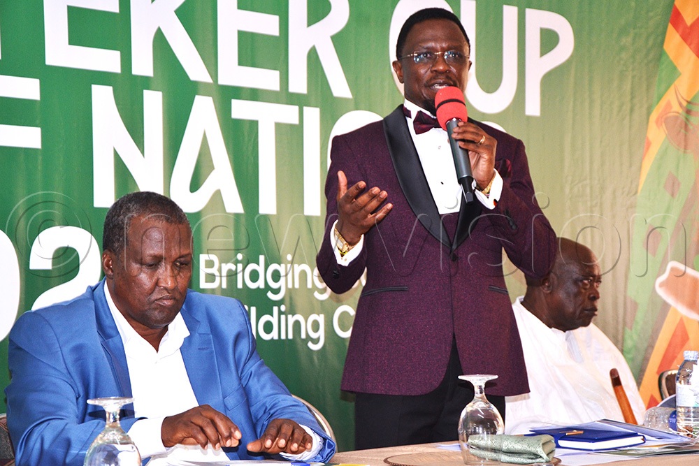 Kenyan Ambassador to Uganda, Ababu Namwamba speaking as Munyes and Peter Lokeris look on during the unveiling of Ateker Cup of Nations in Soroti City. (Credit: by Delux Emmy Alomu)