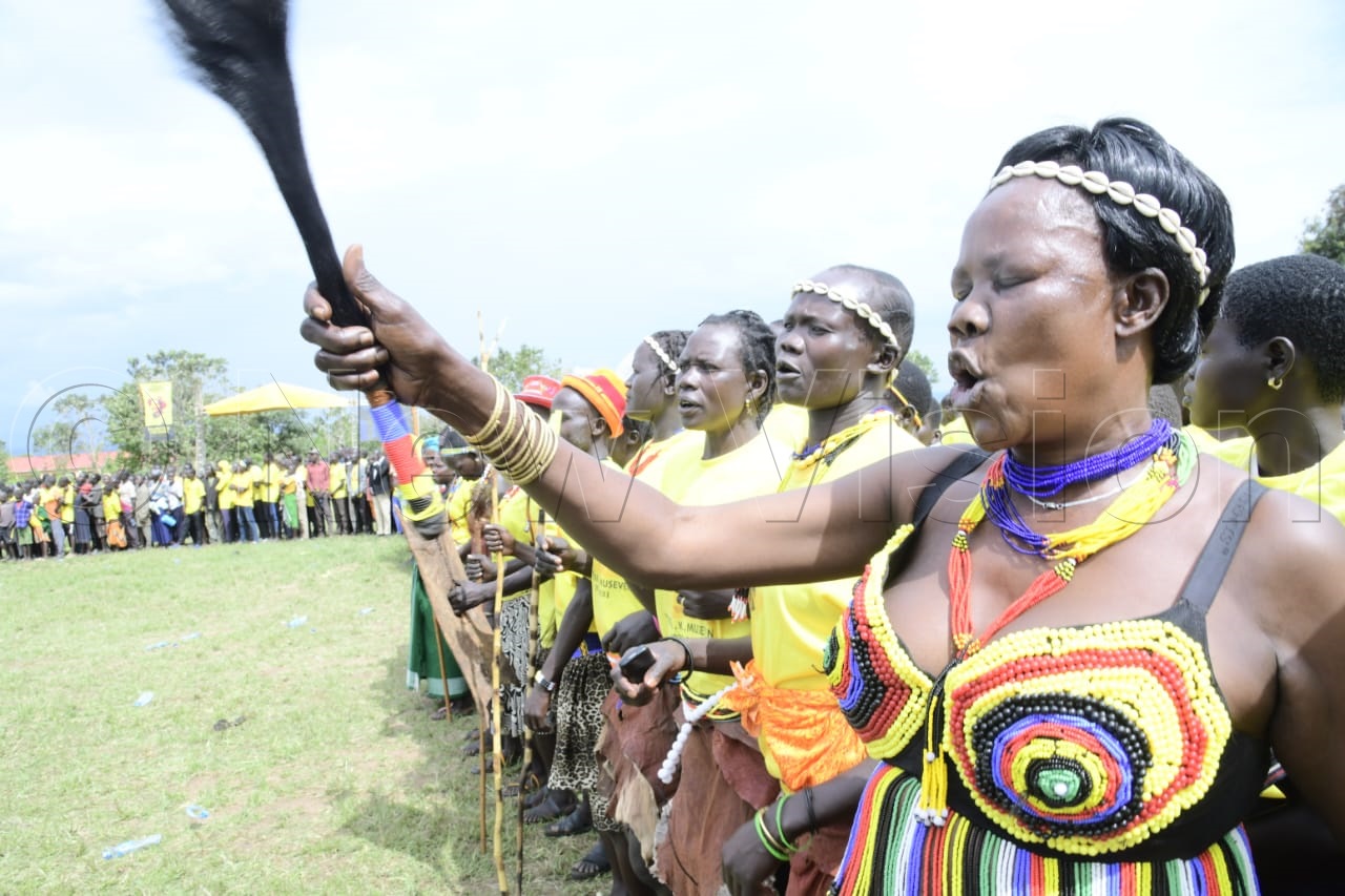 Jubilant supporter welcoming the president at the campaign rally.