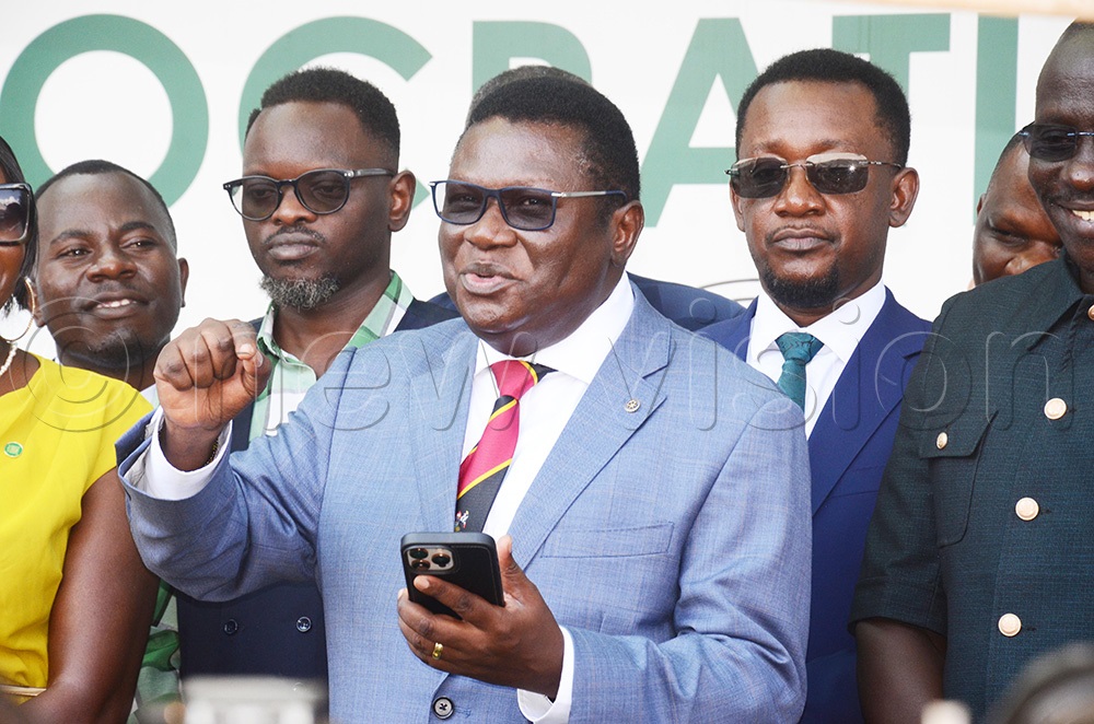 The Laroo-pece Member of Parliament and the Justice and Constitutional Affairs Minister Nobert Mao addressing a press conference at DP Headquarters at Balintuma Road on Tuesday May 19, 2026. (Photo by Isaac Nuwagaba)