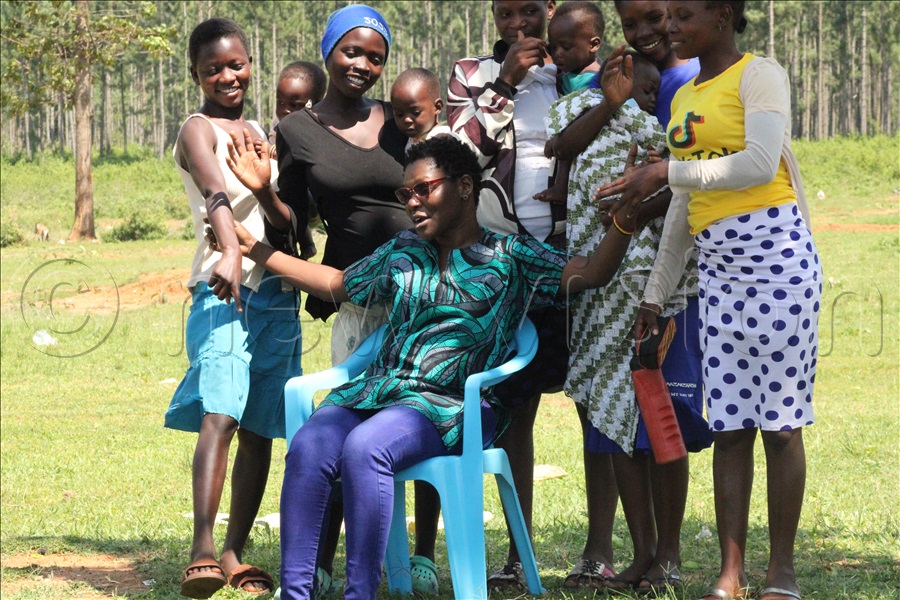 Nankwanga (second from left) with other teenage mothers.