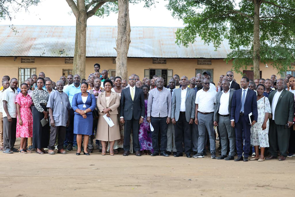 PACEID Team with  management and staff of New Kakinga Millers Enterprise Ltd in Ishongororo town council in Ibanda district. (Courtesy photo)
