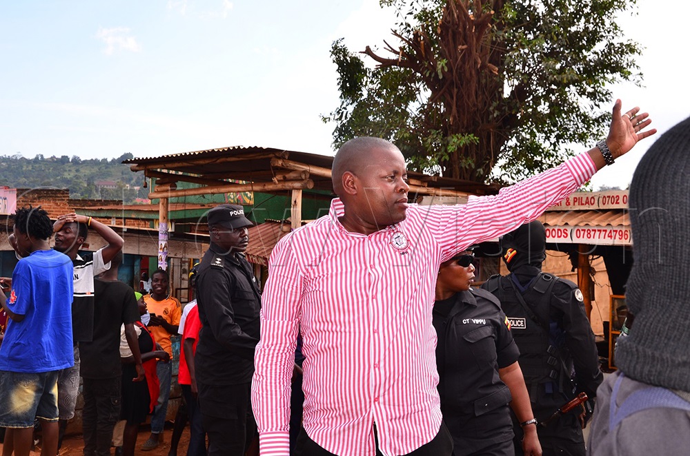 Kasibante gesturing at locals as he mobilised them to join him at a rally in Mafubira trading centre, Jinja city northern division on Wednesday. (Photo by Jackie Nambogga)