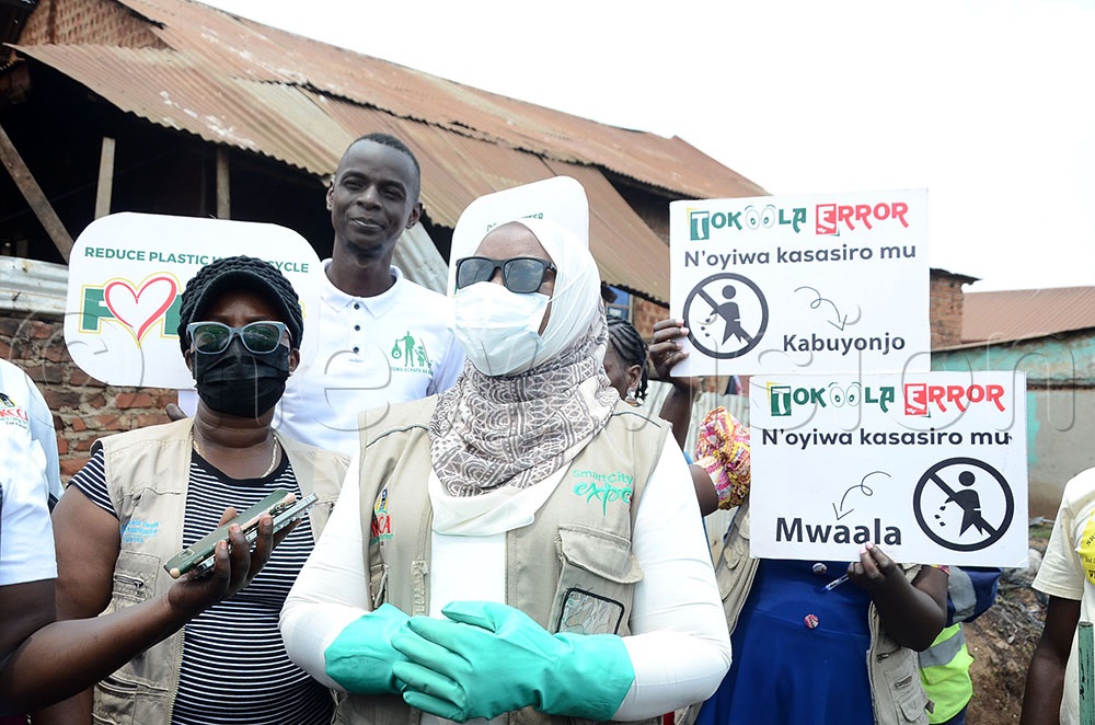 Kampala Capital City Authority (KCCA) Executive Director Sharifah Buzeki addressing residents, as Director for Public Health Dr. Sarah Zalwango looks on. This was during a Weyonje campaign clean up exercise in Ndeeba parish Rubaga division, on September 6, 2025. (Credit: Lawrence Mulondo)