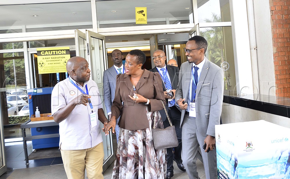 Aisha Sekindi, State Minister for Water, interacts with WASH sector experts as Dr Callist Tindimugaya looks on during a high-level dialogue on climate-resilient water and sanitation services in Uganda held at Sheraton Hotel Kampala on Wednesday, June 24, 2026. (Photo by Juliet Kasirye)
