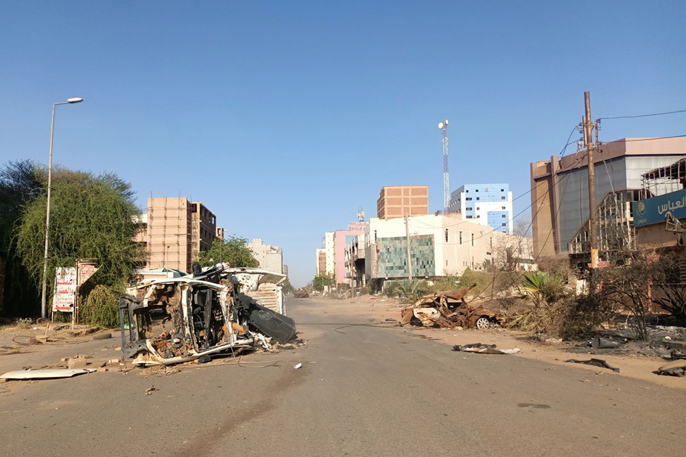 A picture shows debris blocking a road in a southern neighbourhood of Khartoum on March 29, 2025, after the military recaptured the capital. Khartoum has seen more than 3.5 million of its people flee since the war began, according to the United Nations. (Photo by AFP)