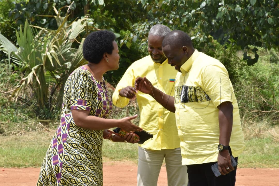 Irene Kauma, Undersecretary/Senior Private Secretary to the First Lady and Minister of Education and Sports, with the Deputy Speaker of Parliament, Thomas Tayebwa and NRM secretary general, Richard Todwong, at the rally.