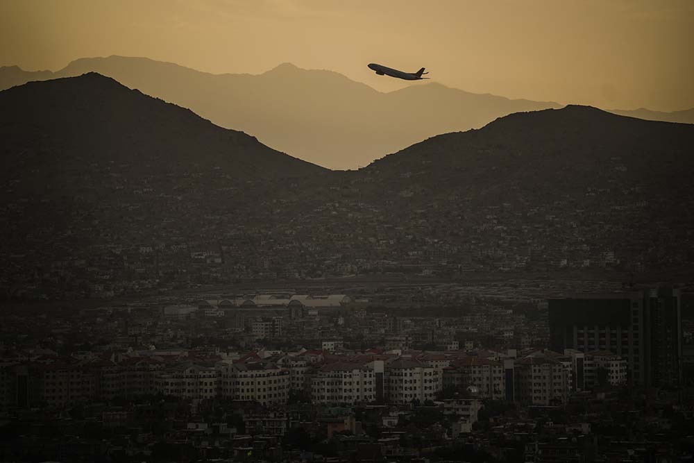 A plane takes off Hamid Karzai International airport in Kabul, Afghanistan on August 4, 2022. Far above Kabul, the cash-strapped Taliban government has located a potentially lucrative revenue stream: Afghanistan's airspace. (AFP/Files)
