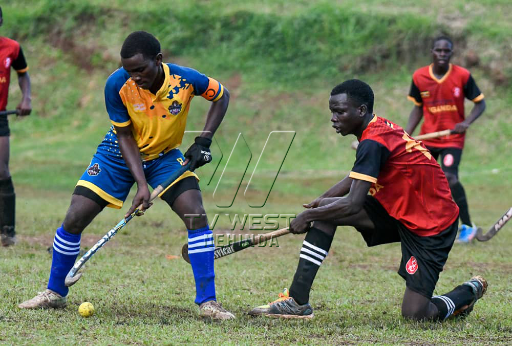 Omuzaani wa Ntare (Red) arikuritana n'owa Kyadondo omu muzaano gwa Hockey.