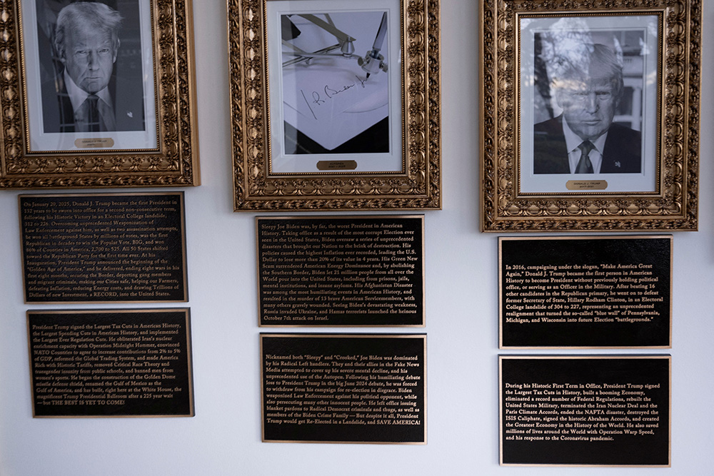 Plaques put up by the Trump administration's Presidential Walk of Fame are seen with descriptions of US presidents along the colonnade of the White House on December 17, 2025 in Washington, DC. (Photo by Brendan Smialowski / AFP)
