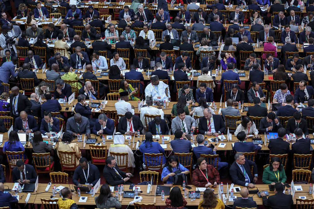 Delegates attend the WTO ministerial conference in Yaounde on March 26, 2026. (AFP)
