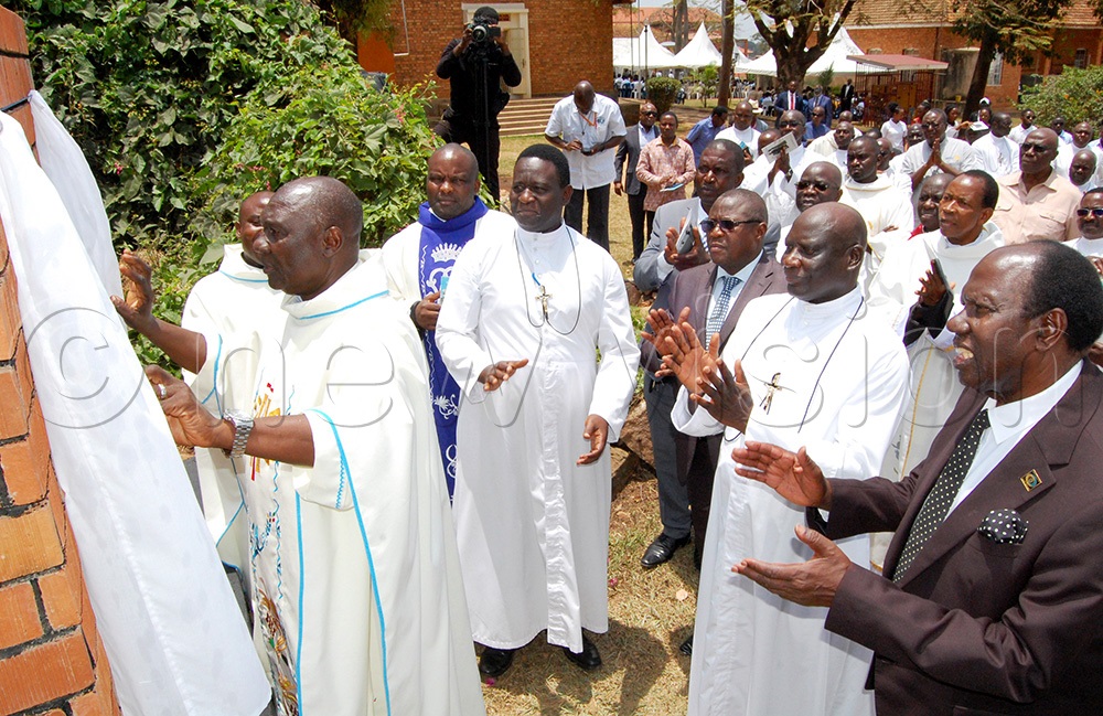 Rev. Msgr. Dr. Larry Ssemusu (fore-front) unveils the foundation stone of the proposed centennial monument of the 100th anniversary of the Brothers of Christian Instruction during the launching of the centennial celebrations of the advent of the  Brothers of Christian Instruction at Mount St. Theresa Kisubi on Wednesday,October 1, 2025. (Photo by Mathias Mazinga)