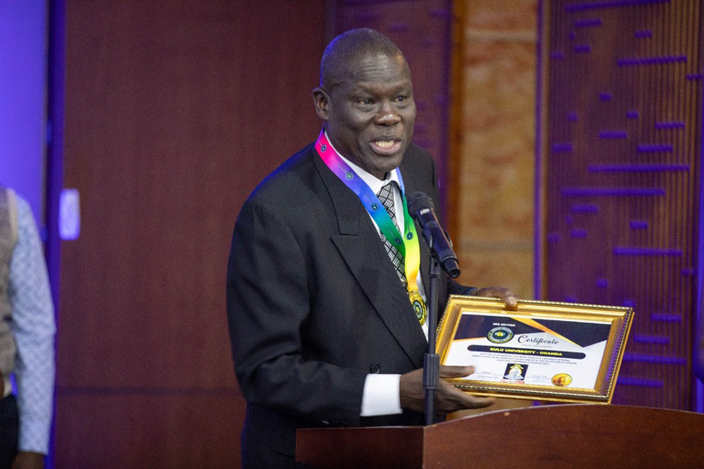 Prof. George Ladaah Openjuru, the vice chancellor, Gulu University, speaking after receiving the award. (Courtesy photo)