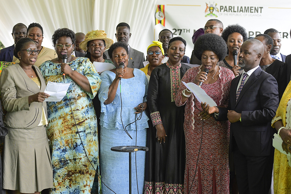 Deputy Speaker of Parliament, Thomas Tayebwa, joined by other guests and government officials during the National Prayer Breakfast. (PPU)