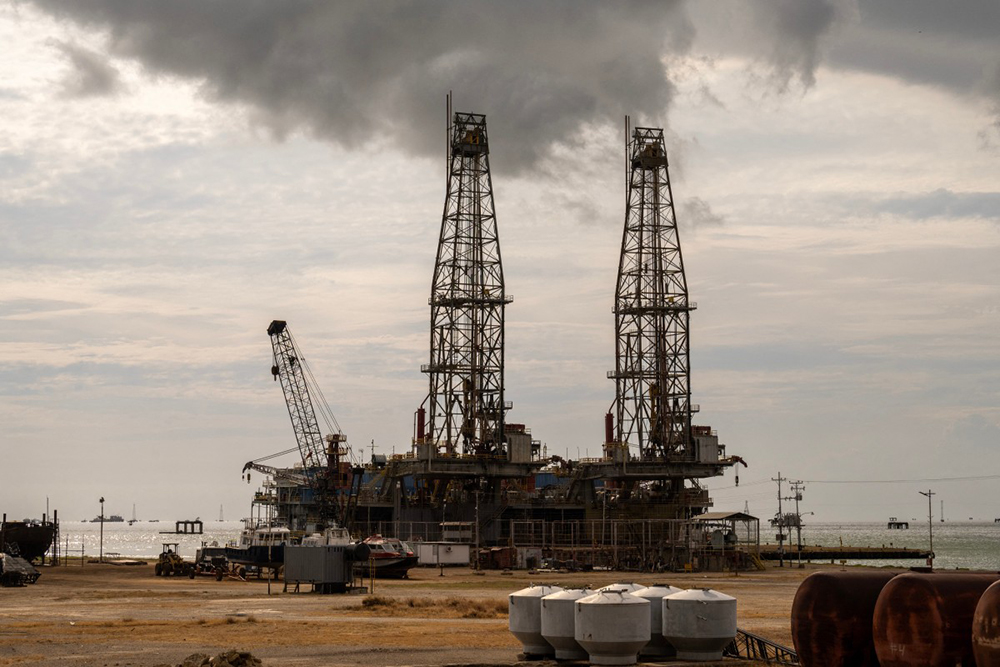 Oil rigs are pictured in Cabimas, south of Lake Maracaibo, Zulia State, Venezuela, on January 31, 2026. The United States on January 29 eased sanctions on Venezuela's oil industry after Venezuelan lawmakers passed reforms paving the way for US companies to return&mdash;a key goal of President Donald Trump's intervention in the country. (Photo by Maryorin Mendez / AFP)