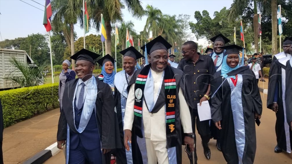 Kakuuto County Member of Parliament in Kyotera District, Geoffrey Lutaaya (C), is among the graduands.