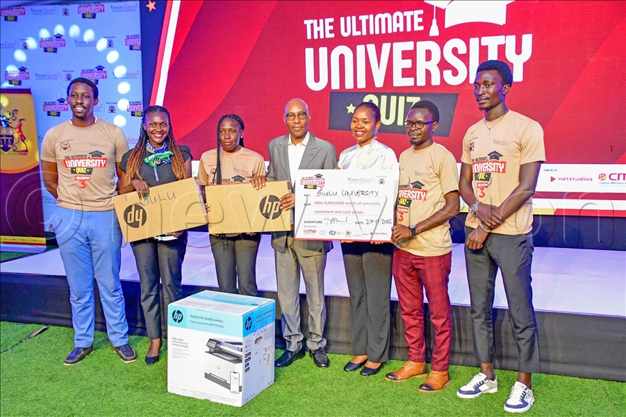 The director Net Studios Africa, Godfrey Mutabazi (center) and the head of public relations and communication Capital Markets Authority (CMA),Lyn Tukei (3rd right) handing over gifts to Gulu University students who emerged 4th in the Ultimate University quiz season three. This was during the awarding ceremony at Vision Group head offices in Kampala on Thursday, November 27, 2025.