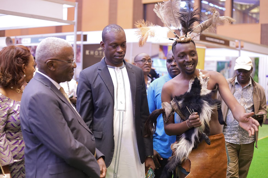 Minister of Tourism, Wildlife and Antiquities Tom Butime and Martin Mugarura appreciate culture as one of tourism attraction in Uganda.