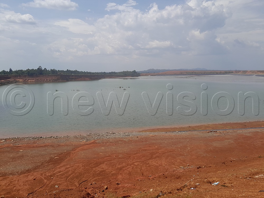 This dam which covers about 80 acres of land is where the dumping of effluent and recycling is done at Wagagai. (Photo by Egessa Hajusu)