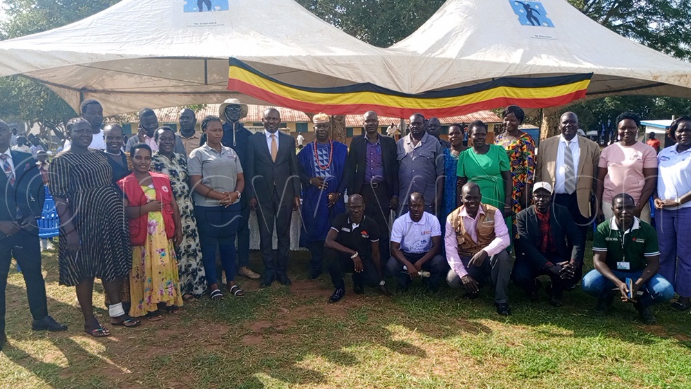Cultural and local leaders in Kitgum District pose for a photo during the celebration of the belated International Labour Day celebrations held at Kitgum Public Playground in Kitgum Municipality. (Photo by Christopher Nyeko)