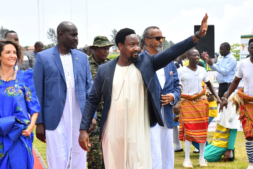 Kyabazinga of Busoga William Gabula Nadiope IV (middle) waving to his subjects as he was arriving at the venue to launch the Busoga Regional Multi-Sectoral Partnerships and Accountability Framework 2026-2030 at Igenge Palace in Jinja City on October 22nd. (Photo by Donald Kiirya)