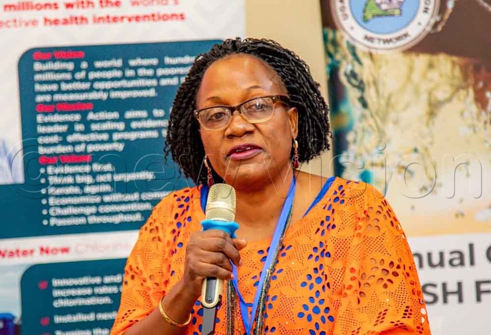 UWASNET Executive Director Yunia Musaazi addressing WASH stakeholders at the 15th WASH CSO Forum at Protea Hotel. (Credit: Jeff Andrew Lule