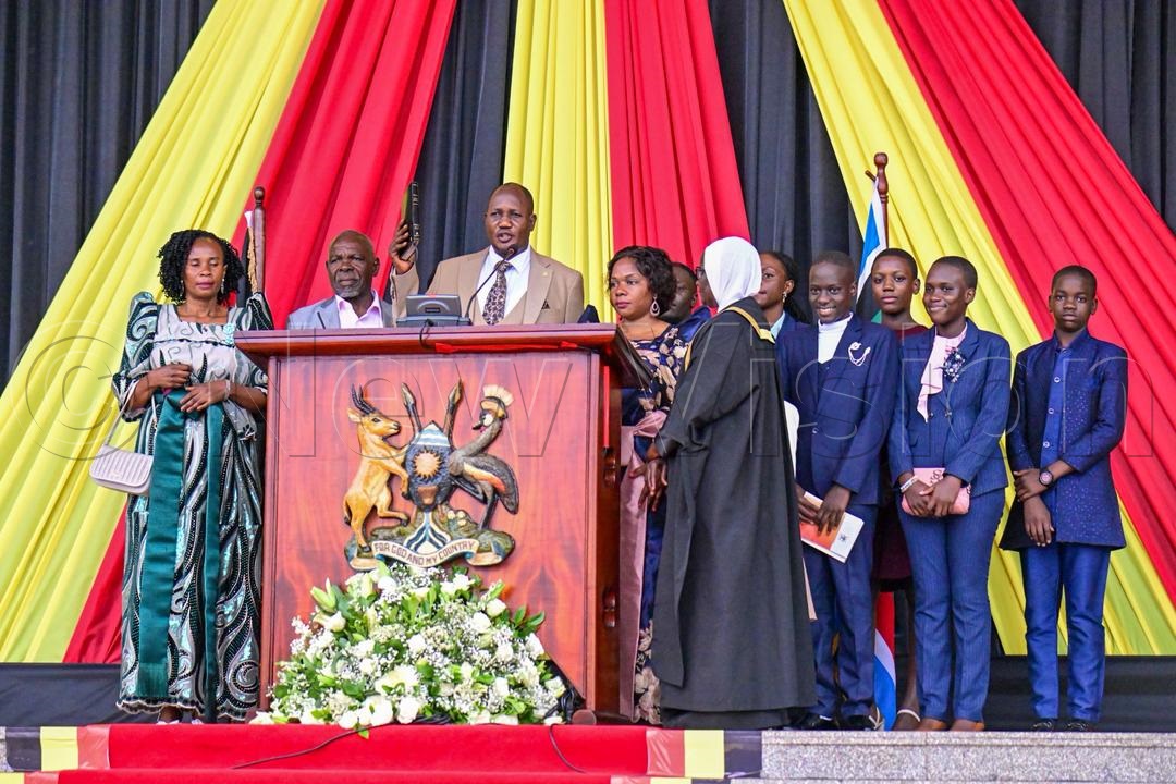 Stephen Kisa taking oath to officially assume office as Member of Parliament for Luuka South. (Photo by Miriam Namutebi)