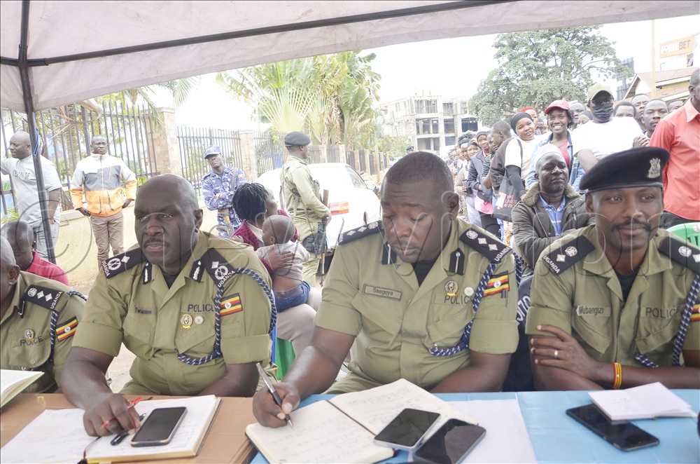 Some of the Police Officers who attending the traders and vendors meeting at Wasanso-Muganzirwaza in Katwe on Saturday. 