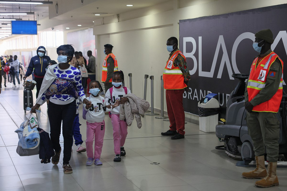 Ghanaian nationals evacuated from South Africa following xenophobia attacks arrive at Accra International Airport in Accra on May 27, 2026. (Photo by Nipah Dennis / AFP)