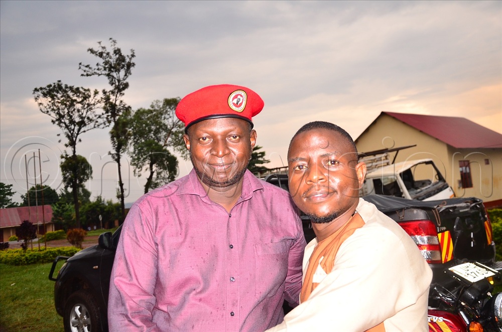  The two opposition Jinja district LC5 contenders, Paul Kirunda Kibbedi (NUP) and FDC's Abdurahman Mujoma (R) having a light moment. 