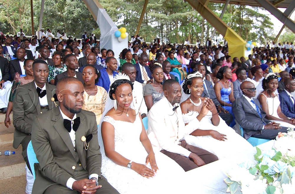 A sectional spectacle of the couples, including the newly-wed, during the celebration. (Photo by Mathias Mazinga)