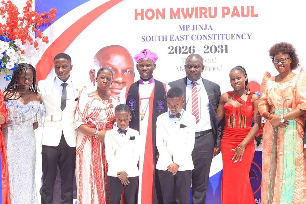 Busoga Diocesan Bishop Rev. Prof. Grace Lubaale (C) with Jinja South East Constituency MP Paul Mwiru (3rd right), his wife (3rd left), children and Jinja City Woman MP Sarah Lwansasula (R) while at the thanksgiving ceremony at Walukuba West playground on May 16th. (Credit: Donald Kiirya)