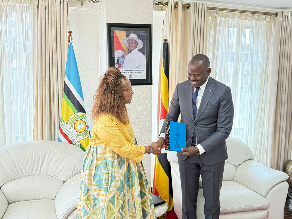 Ms Wanja Kaaria, the newly appointed World Food Programme (WFP) Representative & Country Director in Uganda, presents her Letters of Credence to Minister Haruna Kasolo. (Courtesy)