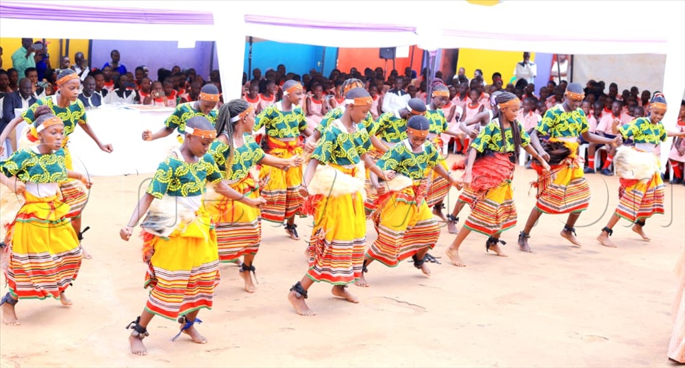 School children entertaining the bishop during his visit.