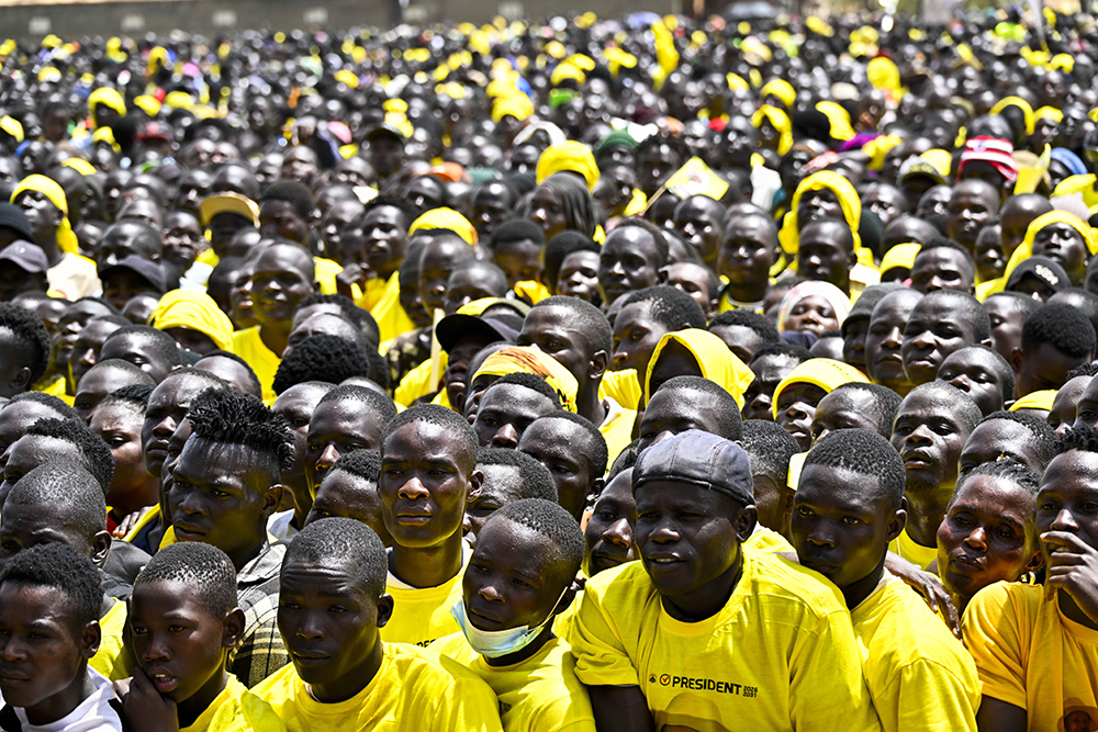 NRM supporters listening to the president's campaign address. (PPU)