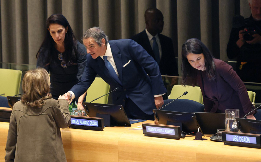 Argentine diplomat Rafael Mariano Grossi (2nd-R), is greeted at the start of a hearing to be considered as the next United Nations' Secretary General at the UN Headquarters in New York, on April 21, 2026. (AFP)