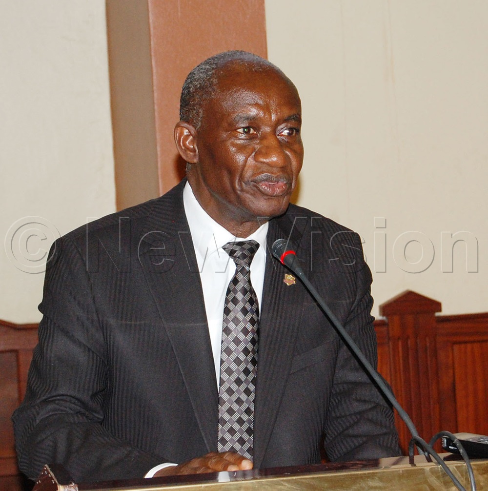 The Head of the Catholic Laity in Uganda, Gervase Ndyanabo, addressing the conference. (Photo by Mathias Mazinga)