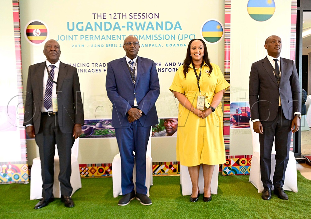 (L-R) Amb. Maj. Gen. (Rtd). Robert Rusoke - High Commissioner, Uganda High Commission Kigali, Amb. Richard Kabonero, Head of Regional Economic Cooperation Department, Ministry of Foreign Affairs, Uganda, Ms Teta Gisa, Director General, Africa Department, Ministry of Foreign Affairs and International Cooperation, Rwanda and ACP Ismael Baguma, Police Liaison Officer, Rwanda High Commission, Kampala, share a group photograph. (Credit: Maria Wamala)