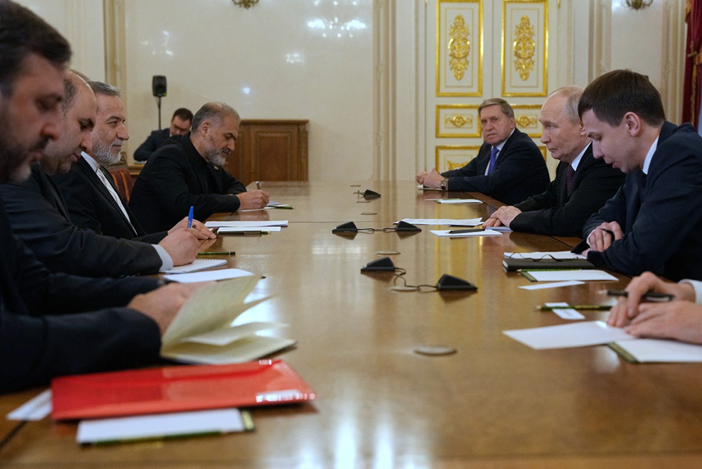 Russian President Vladimir Putin and Iranian Foreign Minister Abbas Araghchi hold talks at the Boris Yeltsin Presidential Library in Saint Petersburg on April 27, 2026. (AFP)