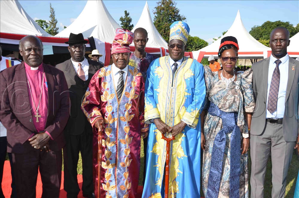 L-R Bishop Emeritus Alfred Acur Okodi of West Lango, deputy speaker, Jimmy Oyuku, Lango chief Odur, Ogwal Oyee and wife then Dr Laury Ocen, the speaker after enthroning Ogwal as clan chief of Inomo clan last year.